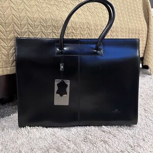 Black Briefcase with Structured Design and Silver Hardware